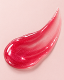 Jelly Pink lip gloss swatch — sheer raspberry pink with shimmer